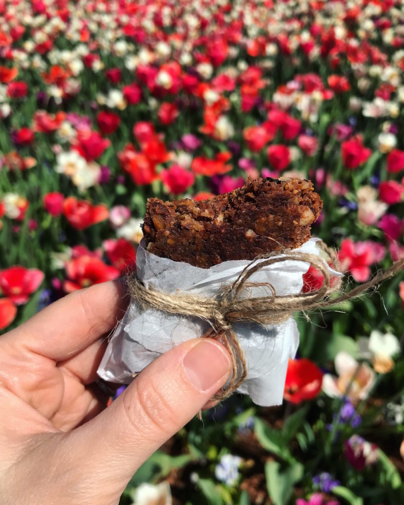 A granola bar wrapped in paper.