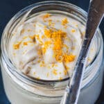 orange tahini dressing in a jar