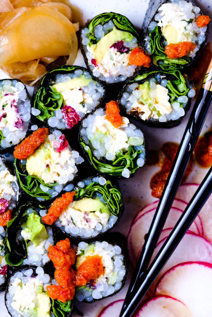 chicken salad nori rolls served on a platter