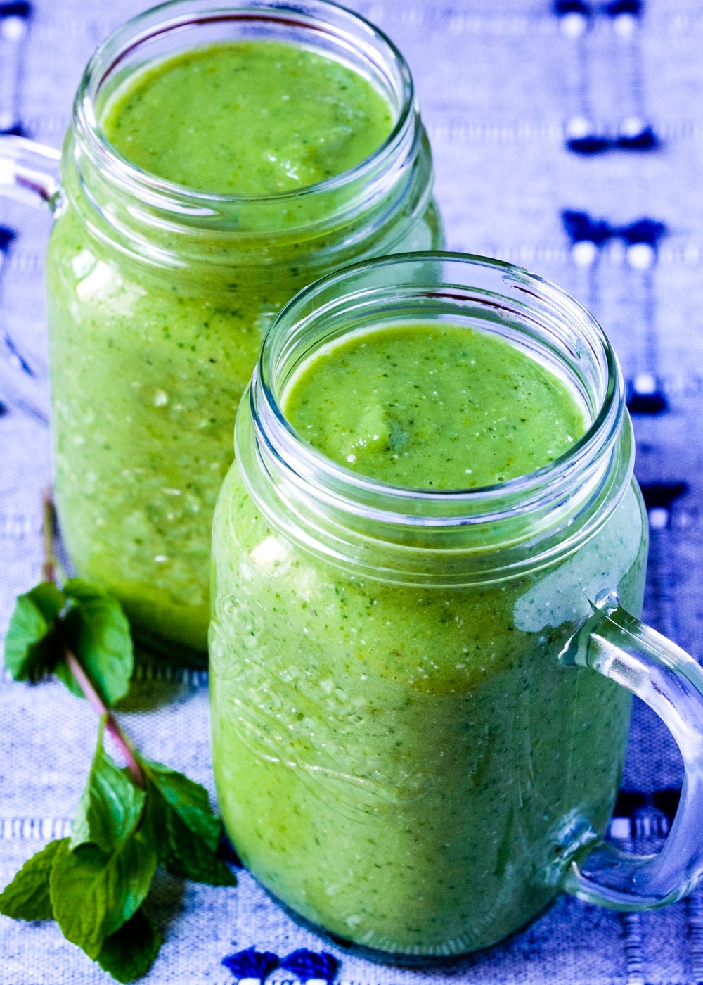 Two jars with the green smoothie