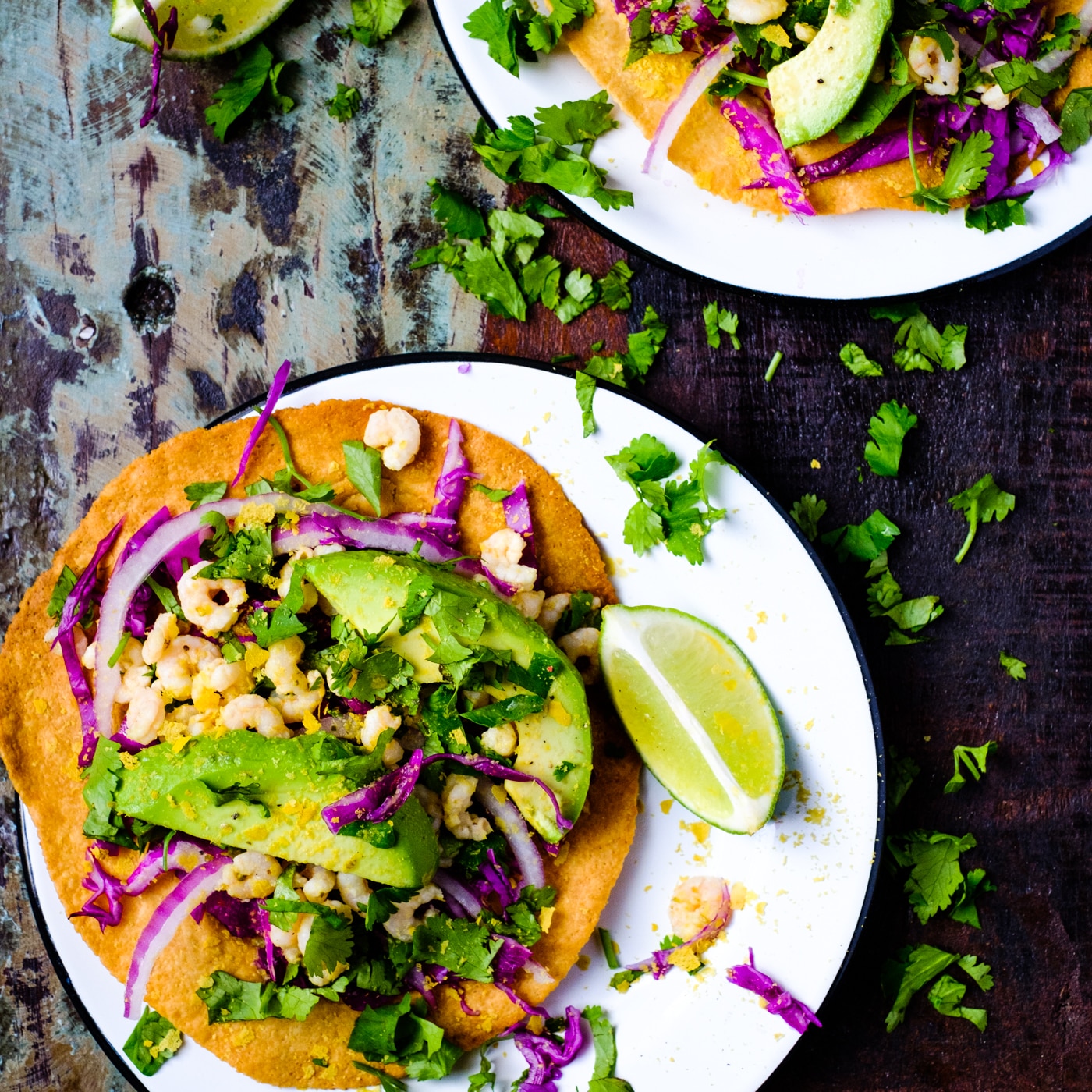 Shrimp tostadas with red cabbage and avocao