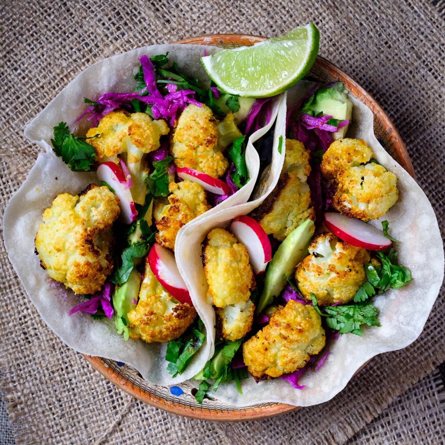 Cauliflower tacos with jicama cabbage slaw