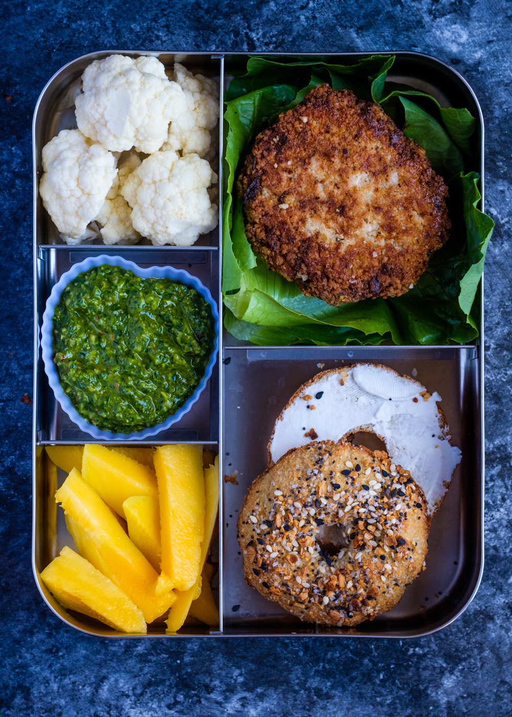 The Alaskan salmon cakes served in a lunch box.