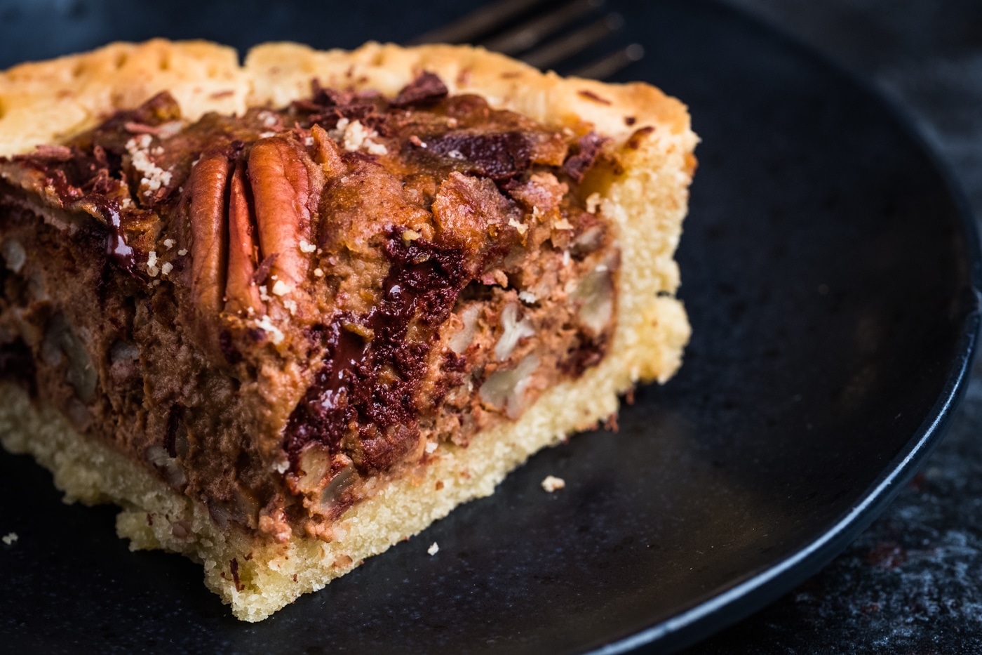 Lectin-Free Bourbon Chocolate Pecan Pie served on a plate