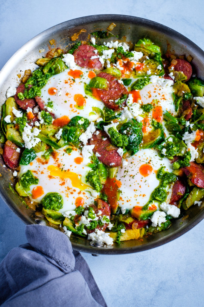 Green Shakshouka with Brussels Sprouts and Smoked Sausage is a great lectin free breakfast