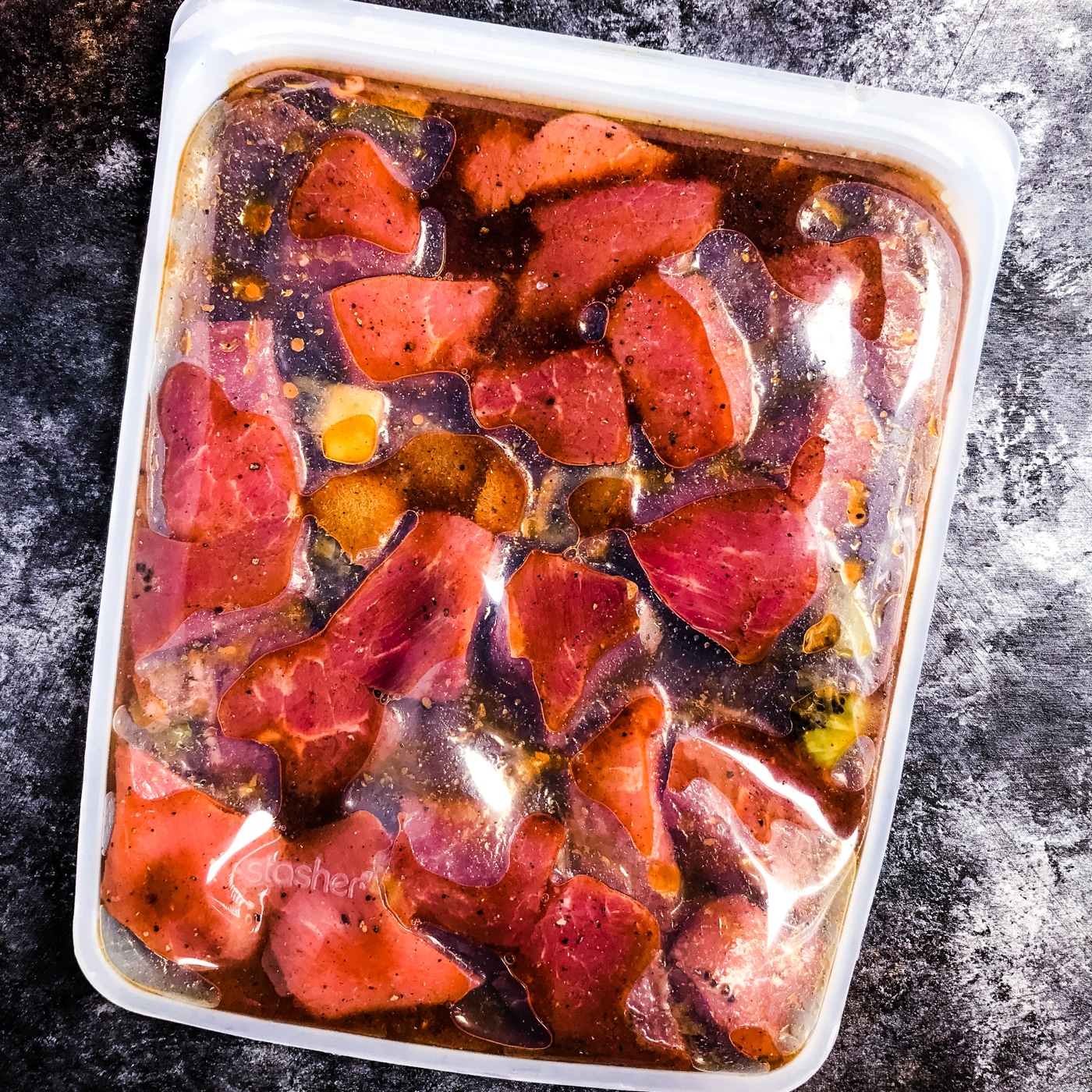 The beef for the kebab platter being marinaded in a Stasher bag