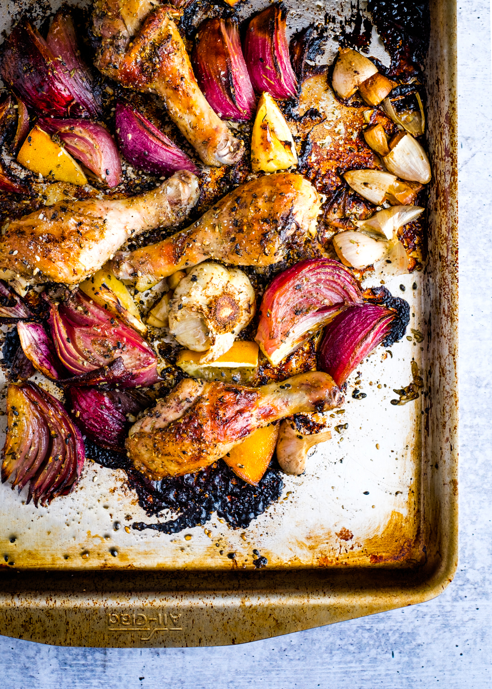 Roasted Zaatar Chicken platter coming out of the oven