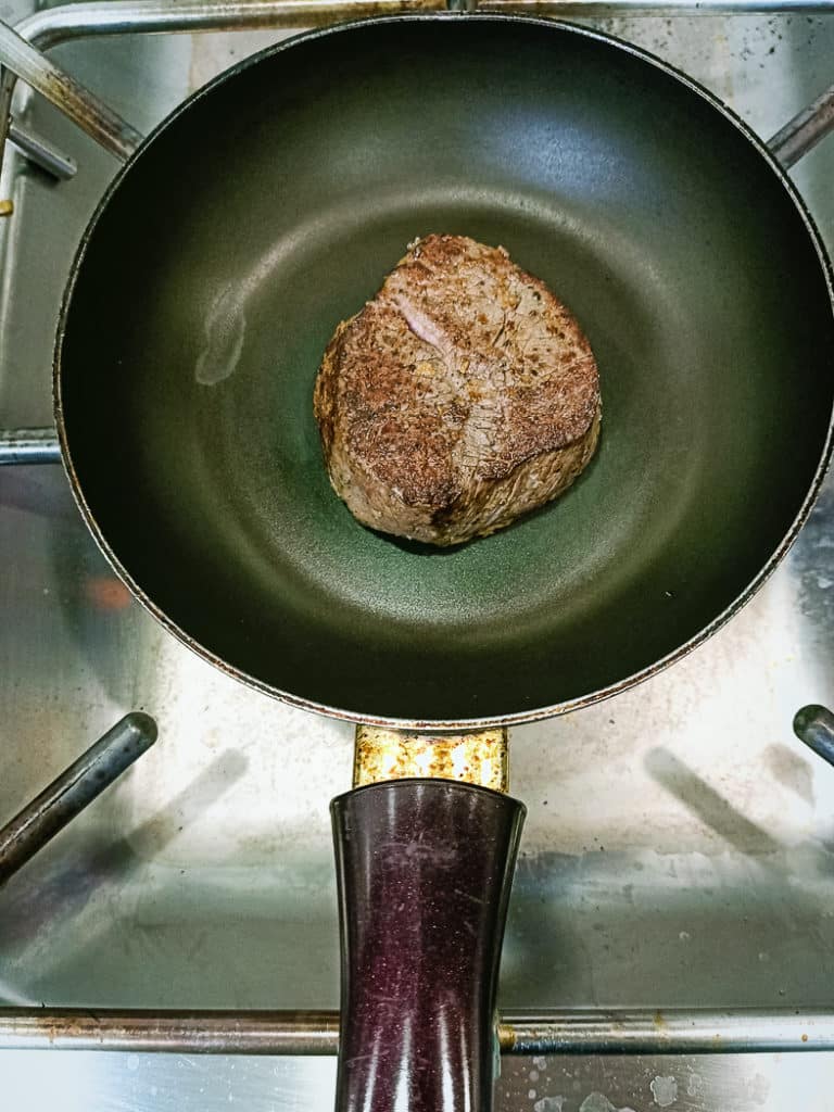 The beef tenderloin steak on a pan