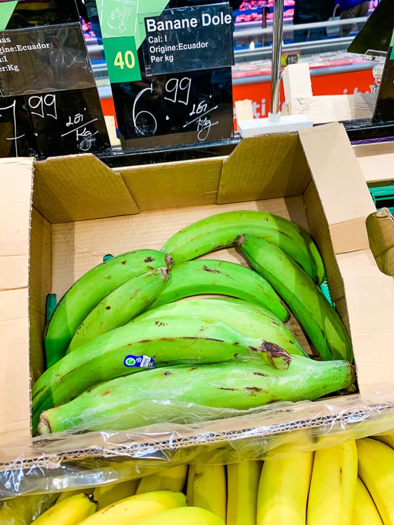 Green plantain in a box in the supermarket