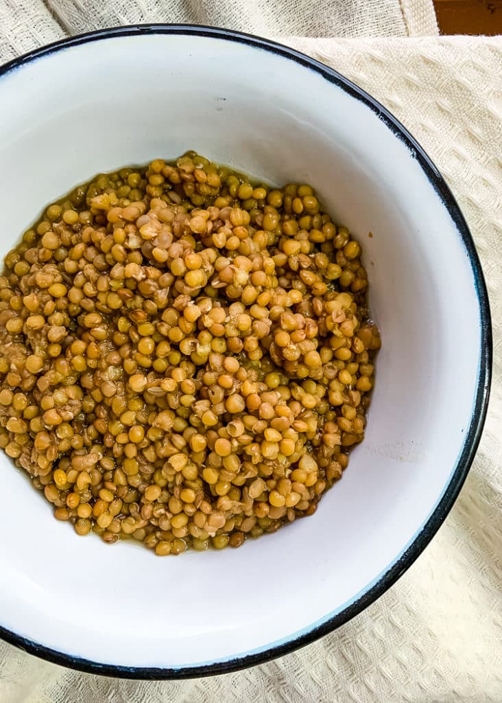 pressure cooked green lentils in a bowl