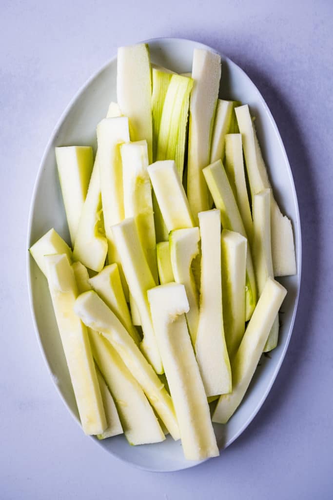 Sliced zucchini and the skin and seeds have been removed