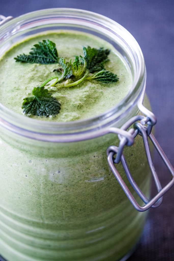 Green pasta sauce in a jar