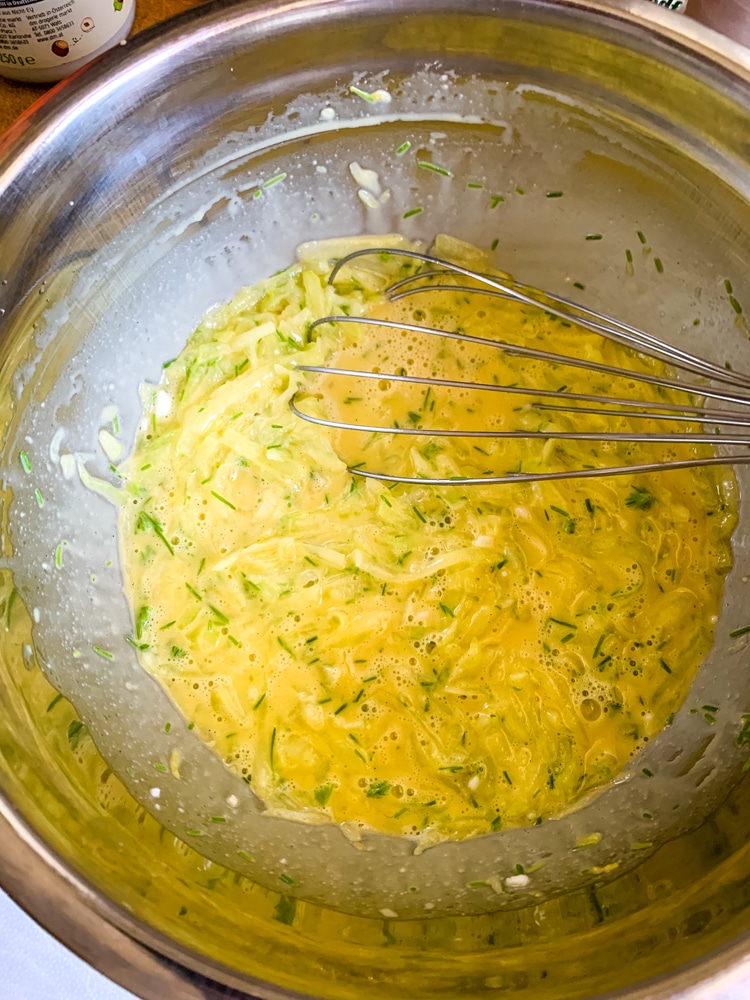 The wet ingredients in a mixing bowl