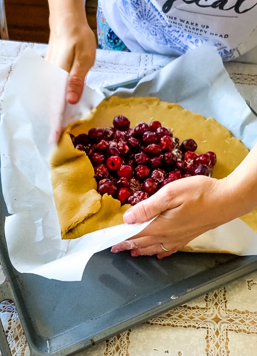 Folding the edges of the dough over the filing