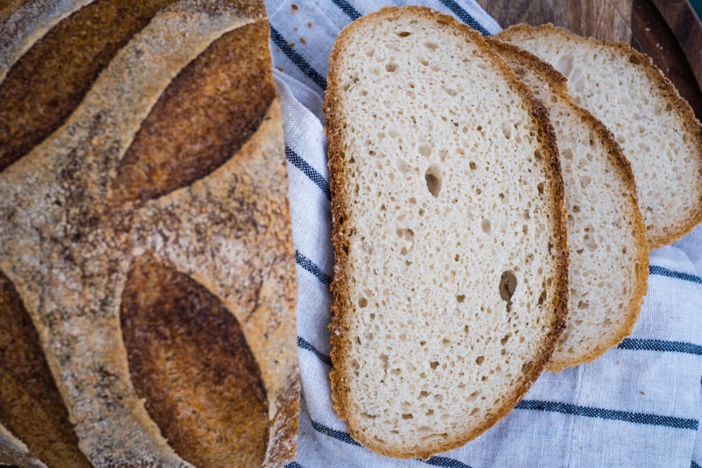 The sliced gluten free sourdough bread. The bread is baked to perfection and the slices look really nice.