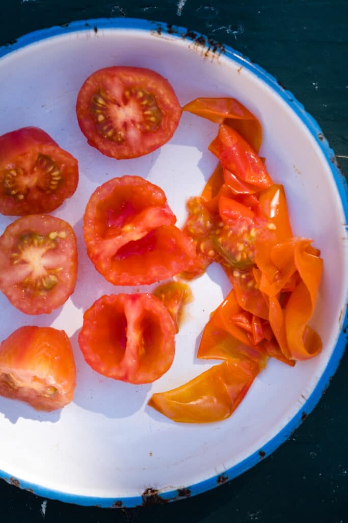 Tomatoes on a plate where the peels and seeds have been removed in order to reduce lectins