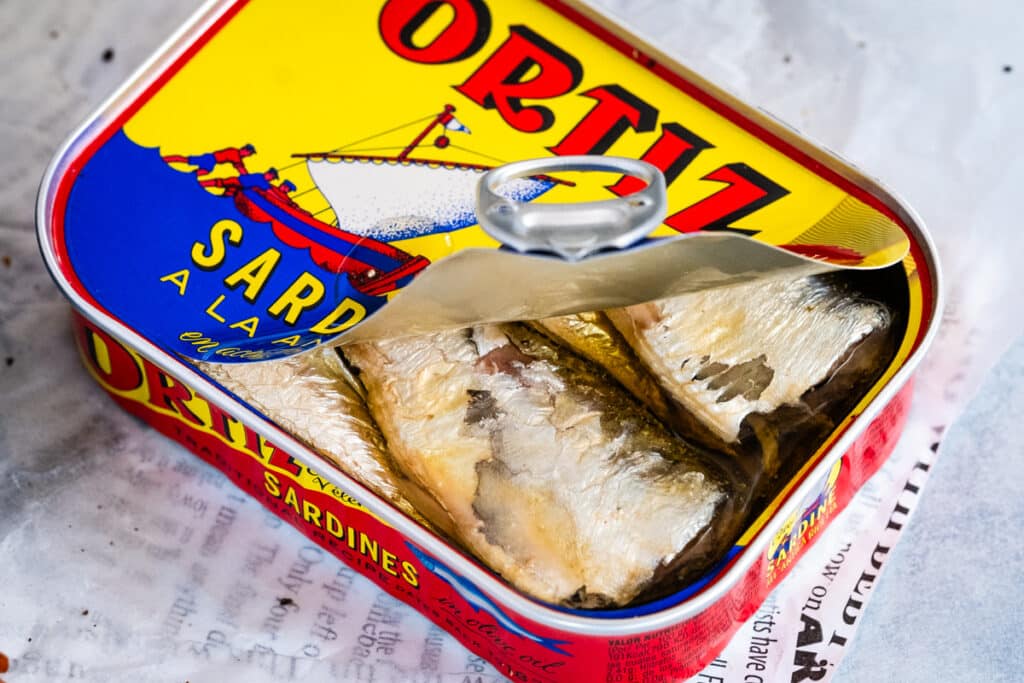 a half-opened can of sardines