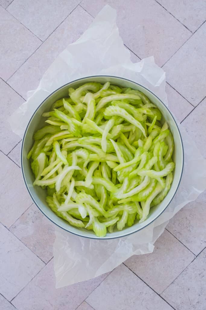 Sliced celery in a small bowl