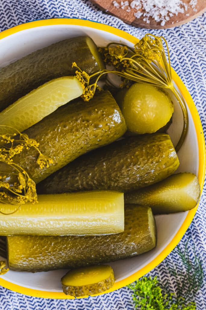 fermented dill pickles on a plate
