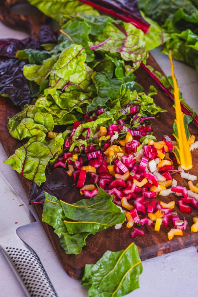 chopped rainbow Swiss chard on a cutting board
