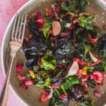 sauteed rainbow swiss chard on a serving plate and a fork