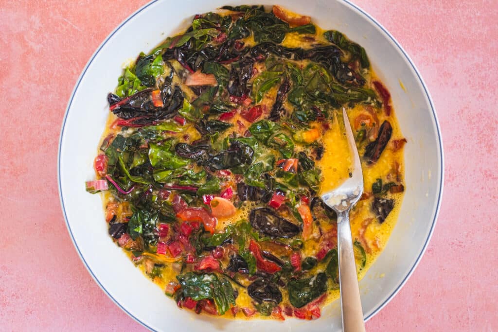 The frittata mixture is in a mixing bowl.