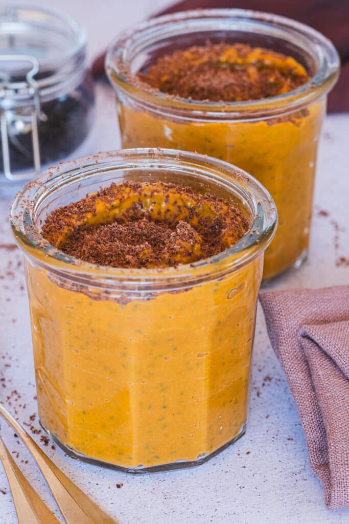 Two jars with basil seed pudding.