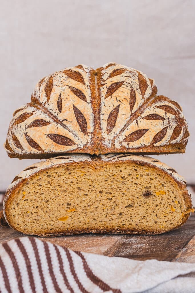 gluten free pumpkin bread sectioned in half, stacked