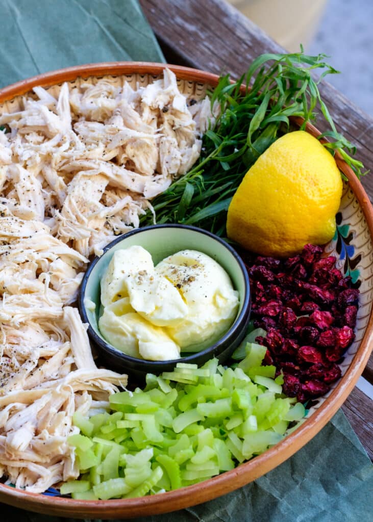 ingredients for tarragon chicken salad on a plate