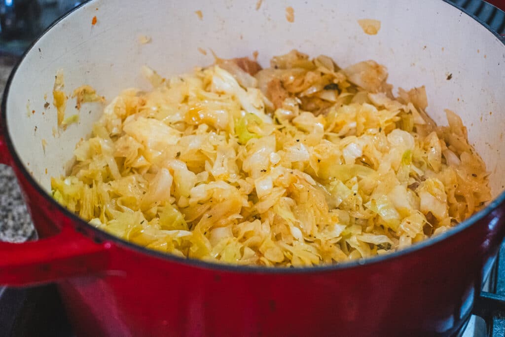 The slow cooked cabbage is now soft and deeply flavorful.