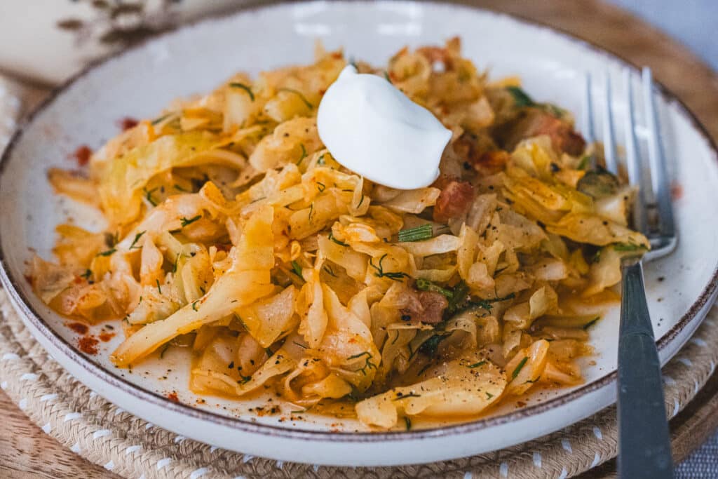 A spoonful of sour cream has been added to the dish.