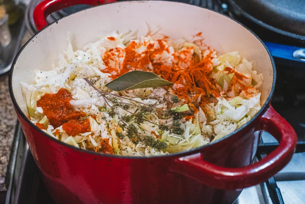 All the herbs and spices have been added to the cooking pot.