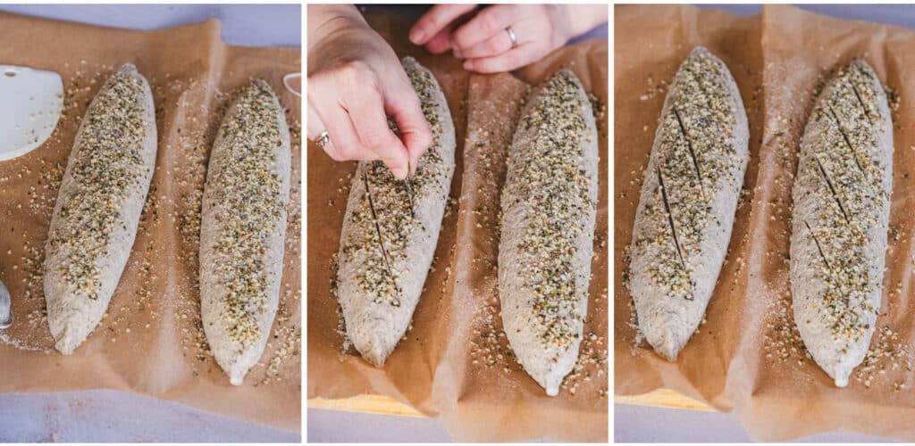 Scoring the two baguettes with a sharp blade to allow for even expansion during baking.