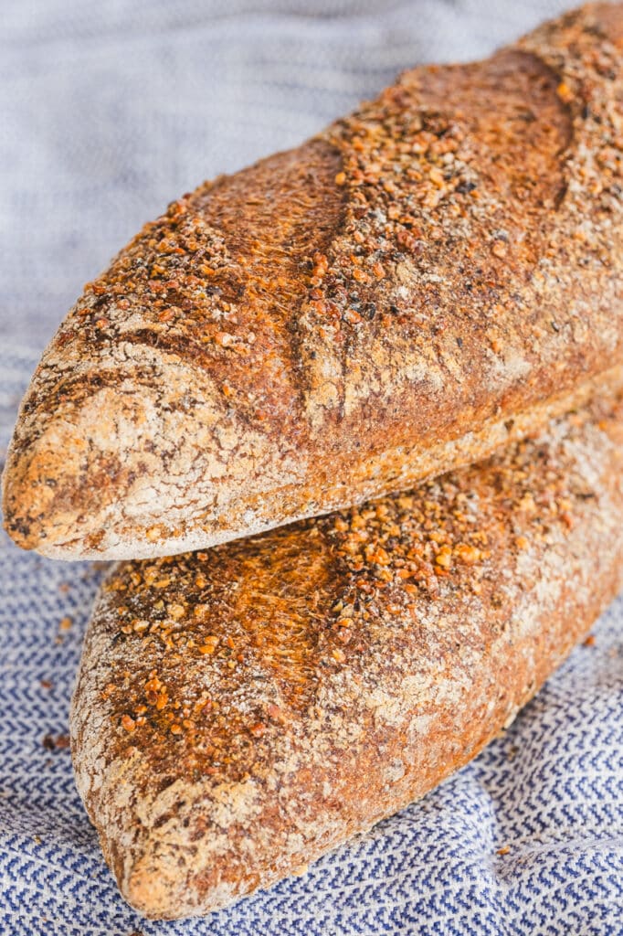 Two gluten-free rustic sourdough baguettes.