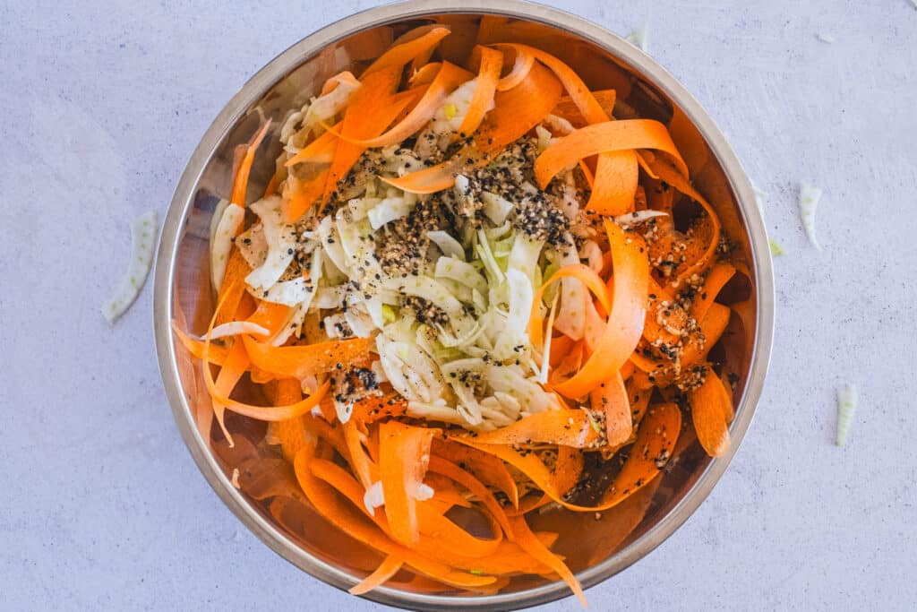 The prepared ingredients in a large mixing bowl.