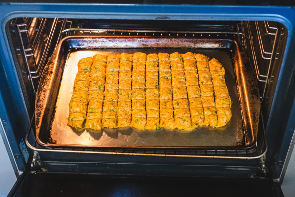 The sheet pan in the oven.