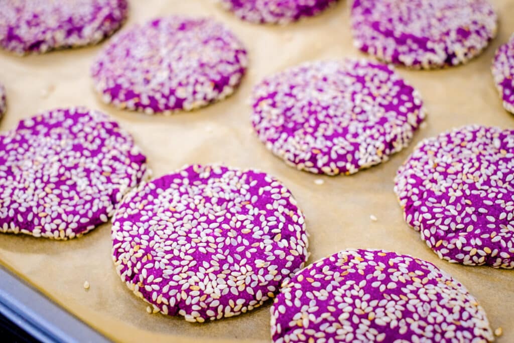 A baking dish with soft purple sweet potato cookies.