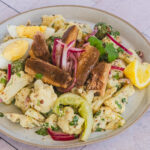 Sardine and cauliflower salad on a platter